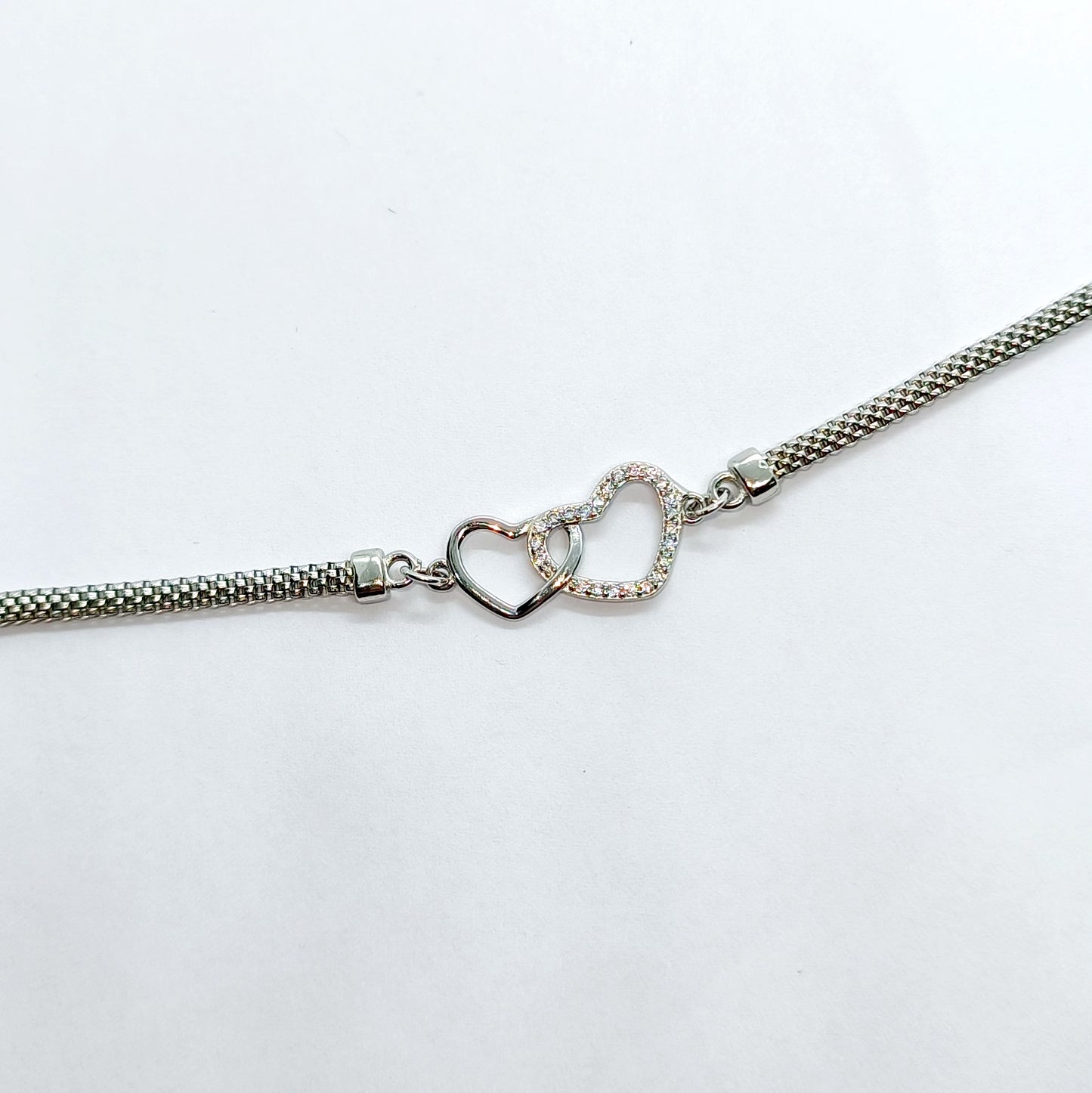 Bracciale incrocio di cuori in argento 925 e zirconi Regolabile