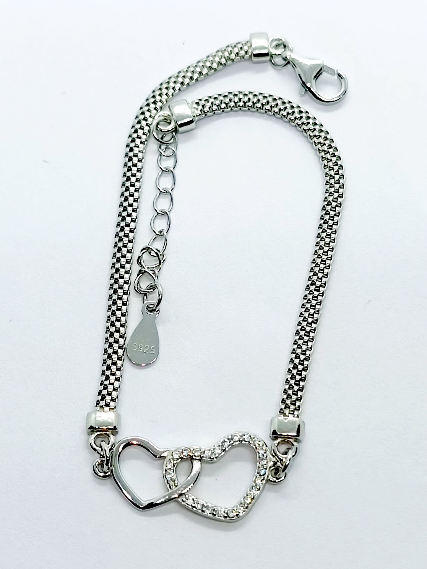 Bracciale incrocio di cuori in argento 925 e zirconi Regolabile