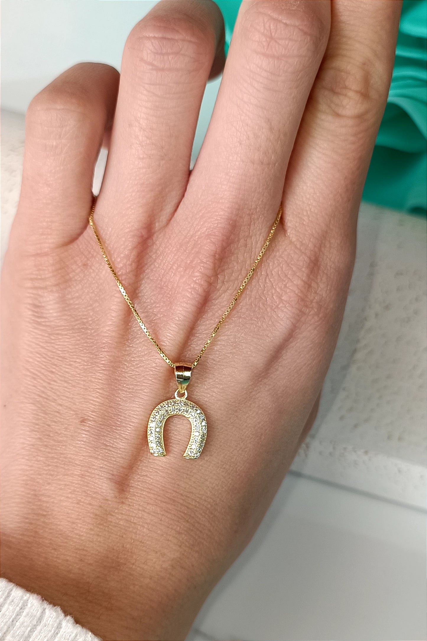 Collana ferro di cavallo bombe’ in argento 925 placcato oro e lavorazione pavé .