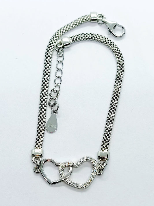 Bracciale incrocio di cuori in argento 925 e zirconi Regolabile